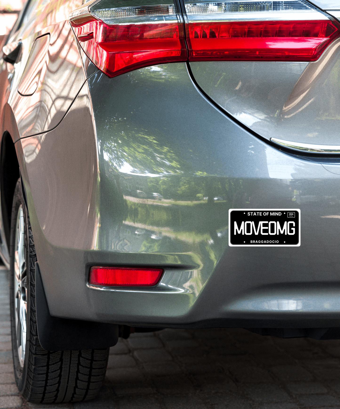 Vanity Plate: MOVEOMG Vinyl Sticker - Braggadocio Design -